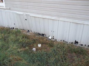 skirting with weedeater damage mobile home foundation
